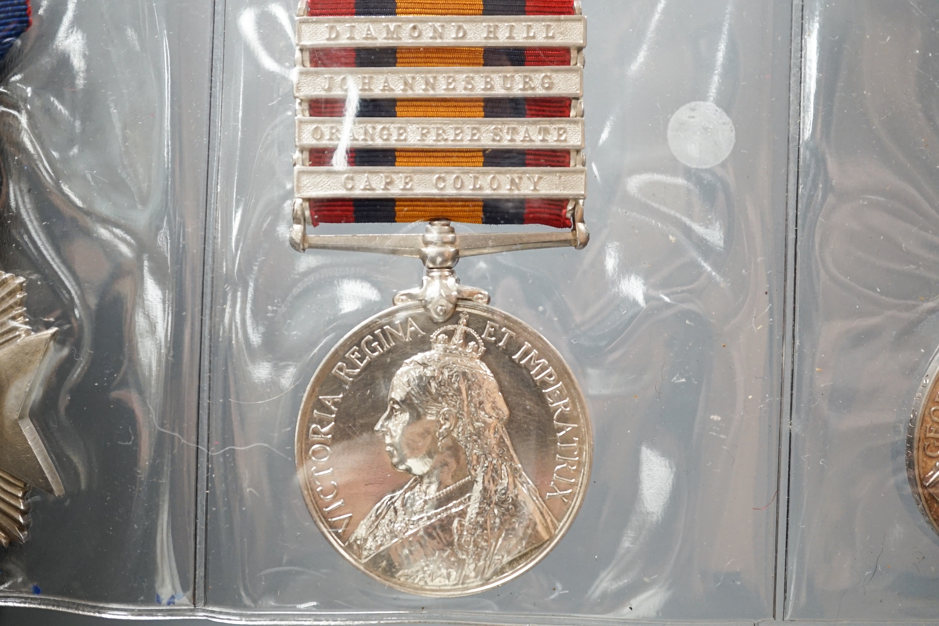 Six military associated medals to include - QSA with four clasps to 184 PTE. T. GRIFFITHS C.I.V., George V Territorial Force Efficiency Medal to 314 SJT. E.H. BARTON 25/ CYC.BN. LOND. REGT. (25th County of London Cyclist